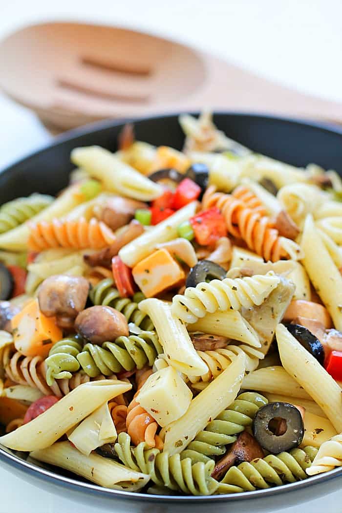 Get ready for the Best Ever Pasta Salad Recipe you'll ever try! It even has a quick, homemade dressing!
