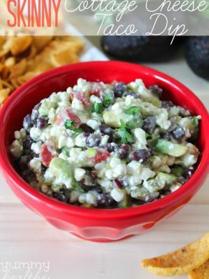 Bright red bowl filled with Cottage Cheese Taco Dip + 43 Healthy Snack Ideas
