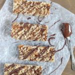 Top view of Easy No-Bake Granola Bars with oats, almonds and coconut with a delicious chocolate & Nutella drizzle on top + 43 Healthy Snack Ideas