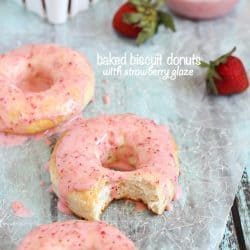 Baked Donuts made with refrigerated biscuits and drizzled with easy and delicious strawberry glaze!