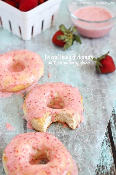 Baked Donuts made with refrigerated biscuits and drizzled with easy and delicious strawberry glaze!