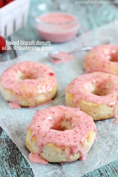 Baked Donuts made with refrigerated biscuits and drizzled with easy and delicious strawberry glaze!