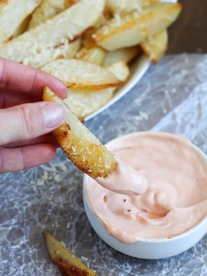 Potato wedges that are baked, sprinkled with parmesan, and then served with fry sauce. Can't wait to try these!