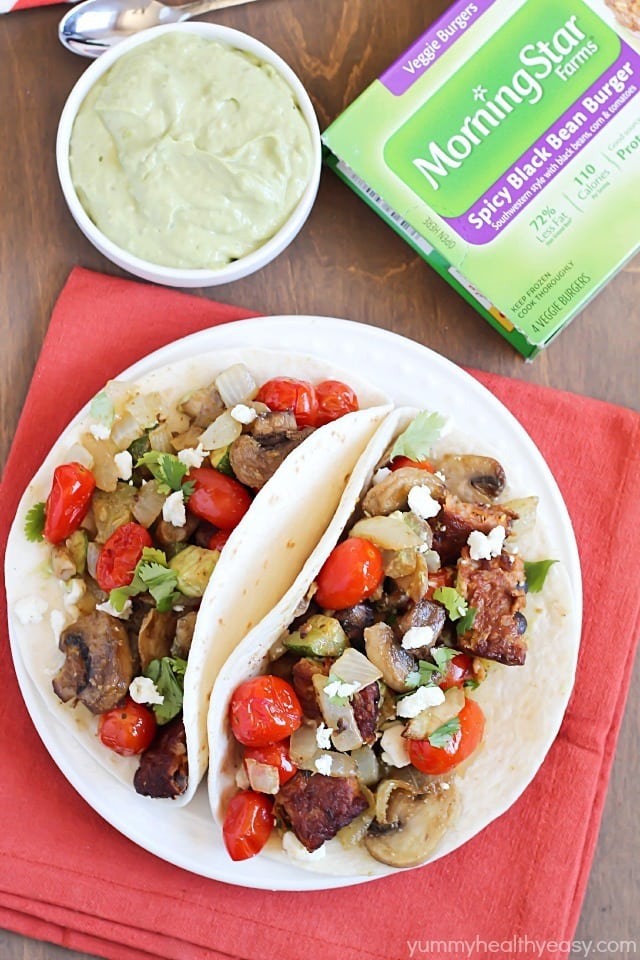 Roasted Vegetable & Black Bean Tacos served with Avocado Crema. Healthy, meatless and delicious! #ad #morningstarfarms
