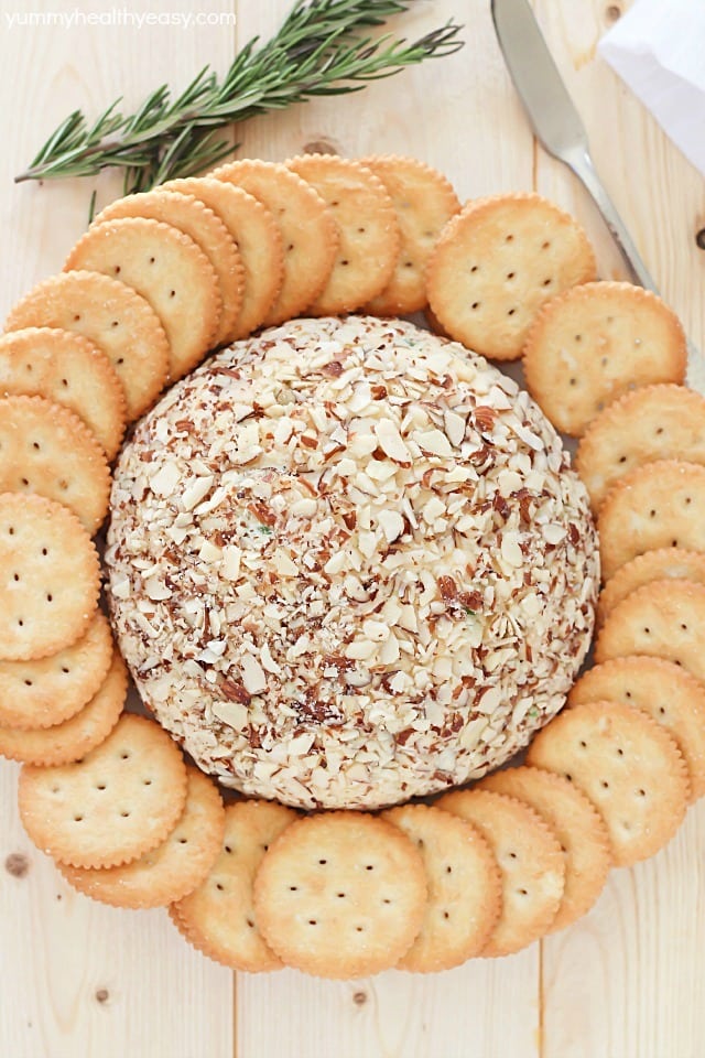 A super easy cheese ball that's sure to impress any guests! It's creamy, tangy, irresistible and won't take more than a few minutes to whip up.