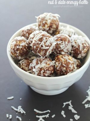 A white bowl full of No-Bake Nut & Date Energy Balls