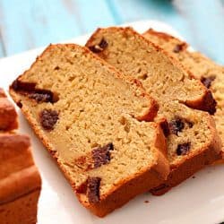 Healthy Banana Bread recipe made with a secret ingredient ;) and all in the food processor! It's moist, decadent and perfect for using up those ripe bananas laying on your counter.