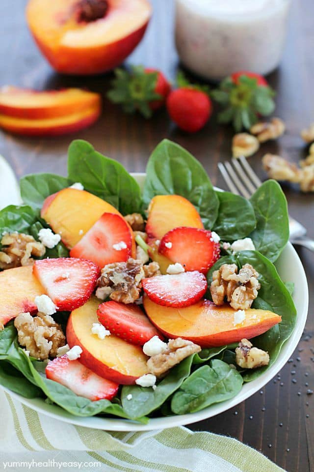 Spinach Salad with strawberries, peaches, candied walnuts, goat cheese and a crazy good (and crazy easy) homemade poppyseed dressing! PLUS a Blendtec Giveaway!
