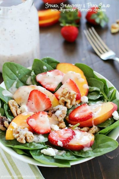 Spinach Salad with strawberries, peaches, candied walnuts, goat cheese and a crazy good (and crazy easy) homemade poppyseed dressing! PLUS a Blendtec Giveaway!