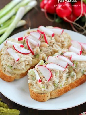 Take that boring tuna sandwich to the next level and make this Mediterranean Hummus Tuna Sandwich Recipe! It's easy, healthy and super flavorful! Definitely a lunchtime winner!