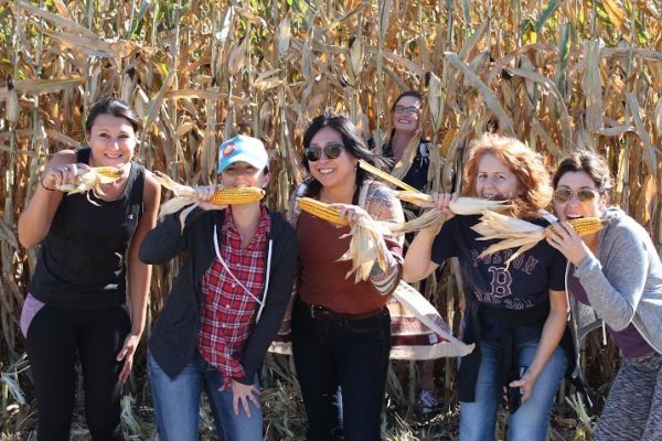 Lovely ladies from Pass the Pork Tour in front of the corn fields by Brenneman Farm!