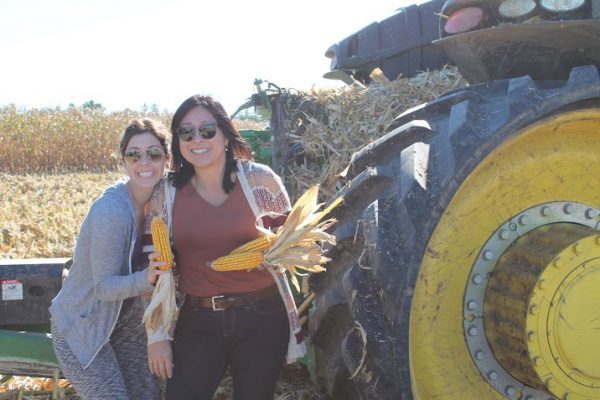 Hanging with Sandra next to the combine tractor!