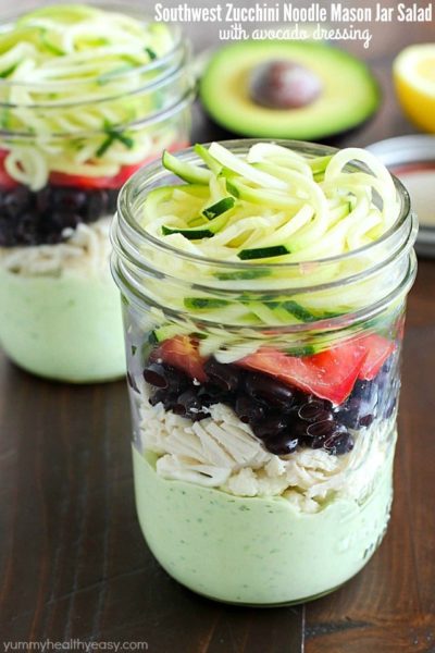 Avocado dressing (southwest style!) is nestled on the bottom of this delicious mason jar salad with zucchini noodles on the top and chicken, veggies and black beans tucked in the middle. A delicious and healthy low-carb, low-sugar lunch prepared ahead of time and eaten on-the-go! Plus a HUGE Blendtec Giveaway you won't want to miss!!