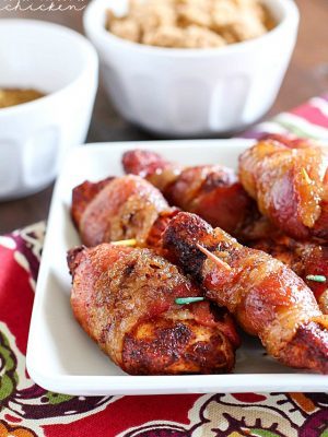 Brown Sugar Bacon Wrapped Chicken is one of my favorite dinners! Making this again tonight! You roll the chicken in spices and then wrap in bacon. Then roll in brown sugar and bake. SO easy, tender, juicy & flavorful. My family loves this chicken dinner! AD