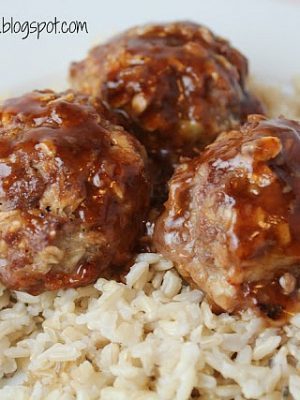 Sweet & Sour Meatballs – incredibly easy and delicious meatballs cooked with a yummy sauce right in the oven! Very little work involved for the perfect meatball dinner!