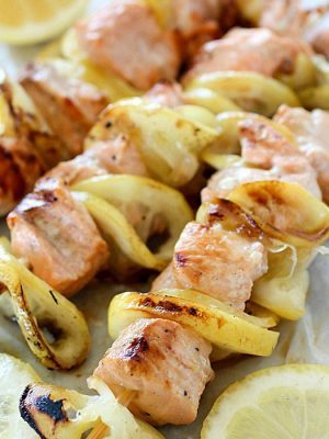 Salmon Skewers tossed in a garlic-lemon sauce and then grilled. So simple and so flavorful! Salmon and citrus is combined to create the result of a crazy delicious, tender, lemony salmon that is like heaven on a stick!