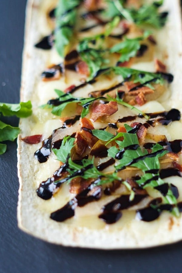 Pear, Brie and Bacon Flatbread are a simple dinner filled with sweet, salty and savory flavors that can be on your table in 15 minutes!