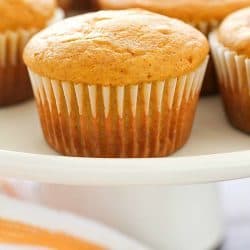 Easy Pumpkin Muffins are the perfect fall breakfast or snack! Using Bisquick as a shortcut makes these just about the easiest pumpkin muffins ever! Only 7 ingredients and 120 calories, you and your family will LOVE these delicious, light & fluffy easy pumpkin muffins for a quick fall breakfast!