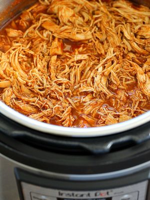 This Instant Pot Salsa Chicken is my go-to dinner on a busy day! So easy and the chicken is always tender and juicy! Super easy to make any night of the week!