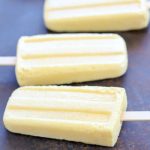 Making homemade popsicles is so easy! These Tropical Protein Popsicles are filled with protein and taste like a tropical vacation! YUM! #AD