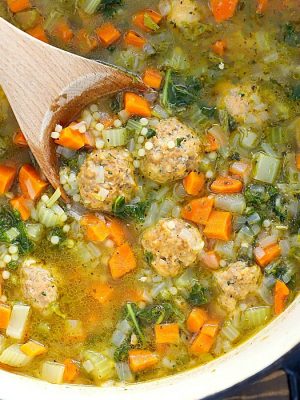 We can't get enough of this Italian Wedding Soup Recipe! It's quick, easy and absolutely delicious!