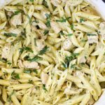 If you love pesto and pasta, you will devour this Creamy Chicken Pesto Pasta Recipe! It's so quick and easy to make, only has a couple of ingredients and tastes amazing!