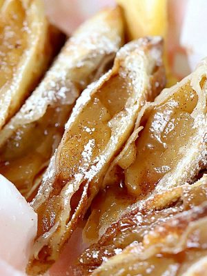 Overhead view of dessert egg rolls cut in half.