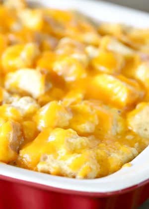 cheesy strata in a red casserole dish