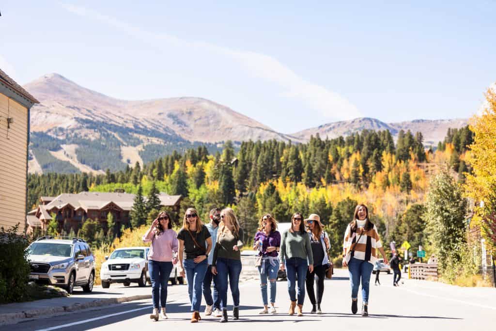 Bloggers walking on a Colorado street.